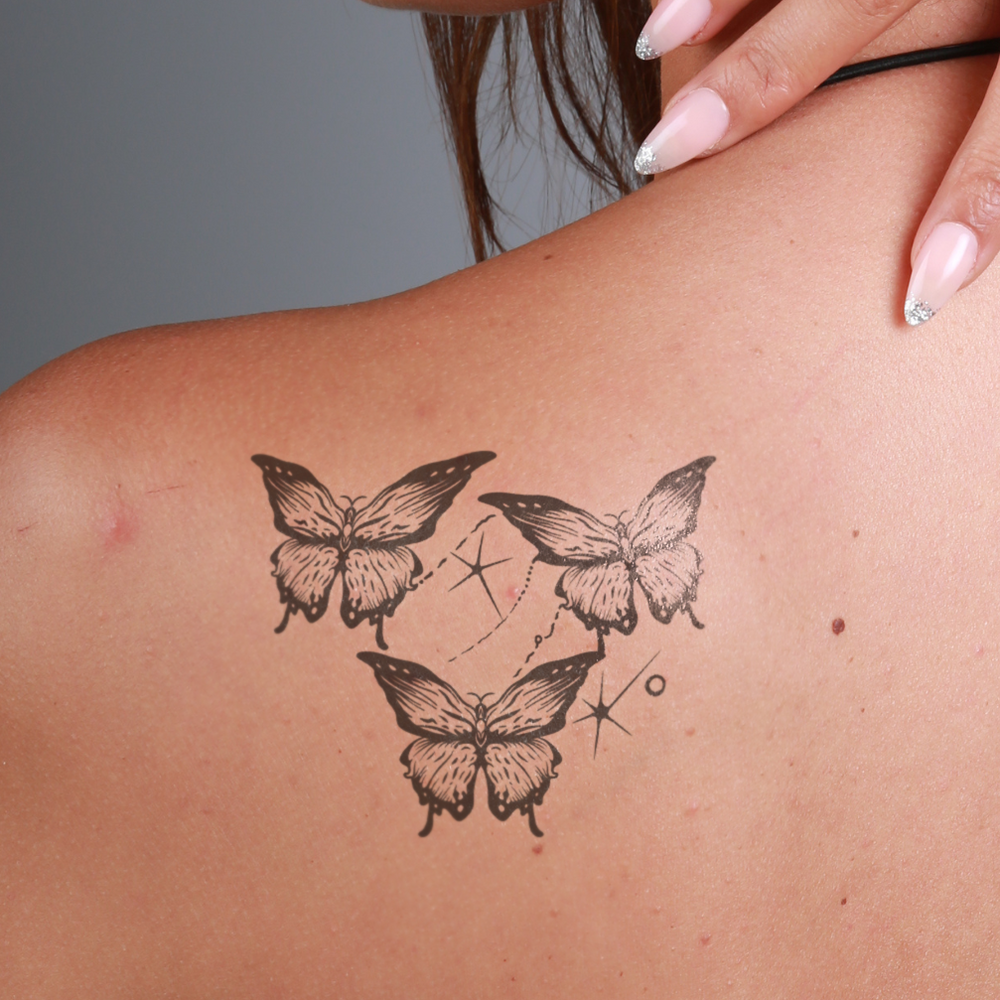 tatouage temporaire trio de papillons epaule
