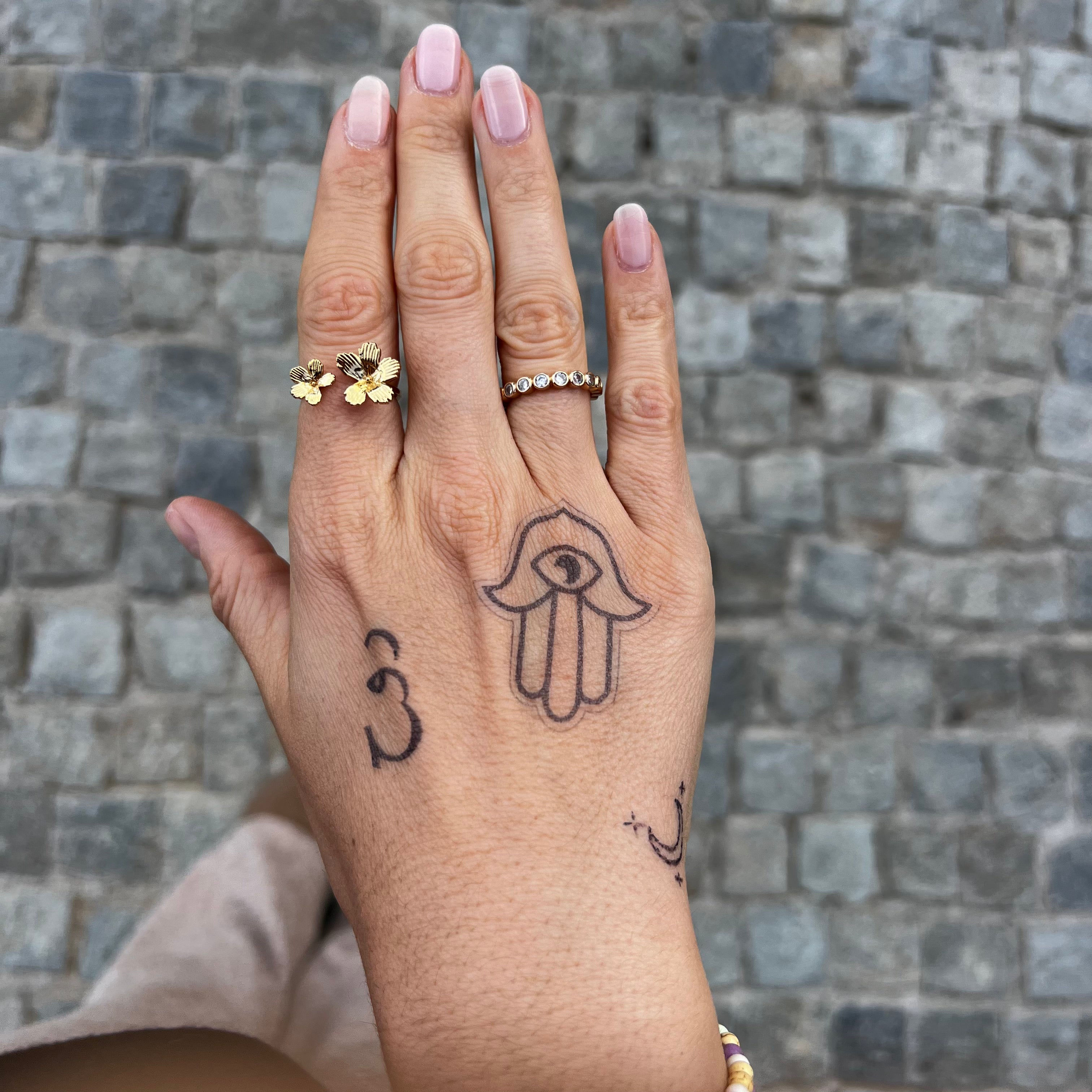 Tatouage Main De Fatima Sur Pied