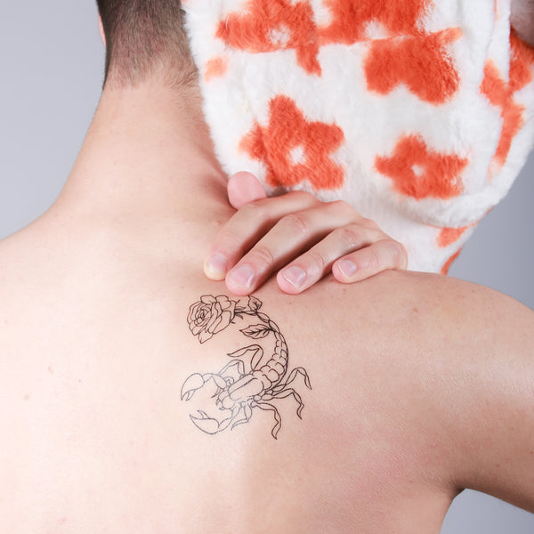 Scorpion Tattoo on Woman's Neck