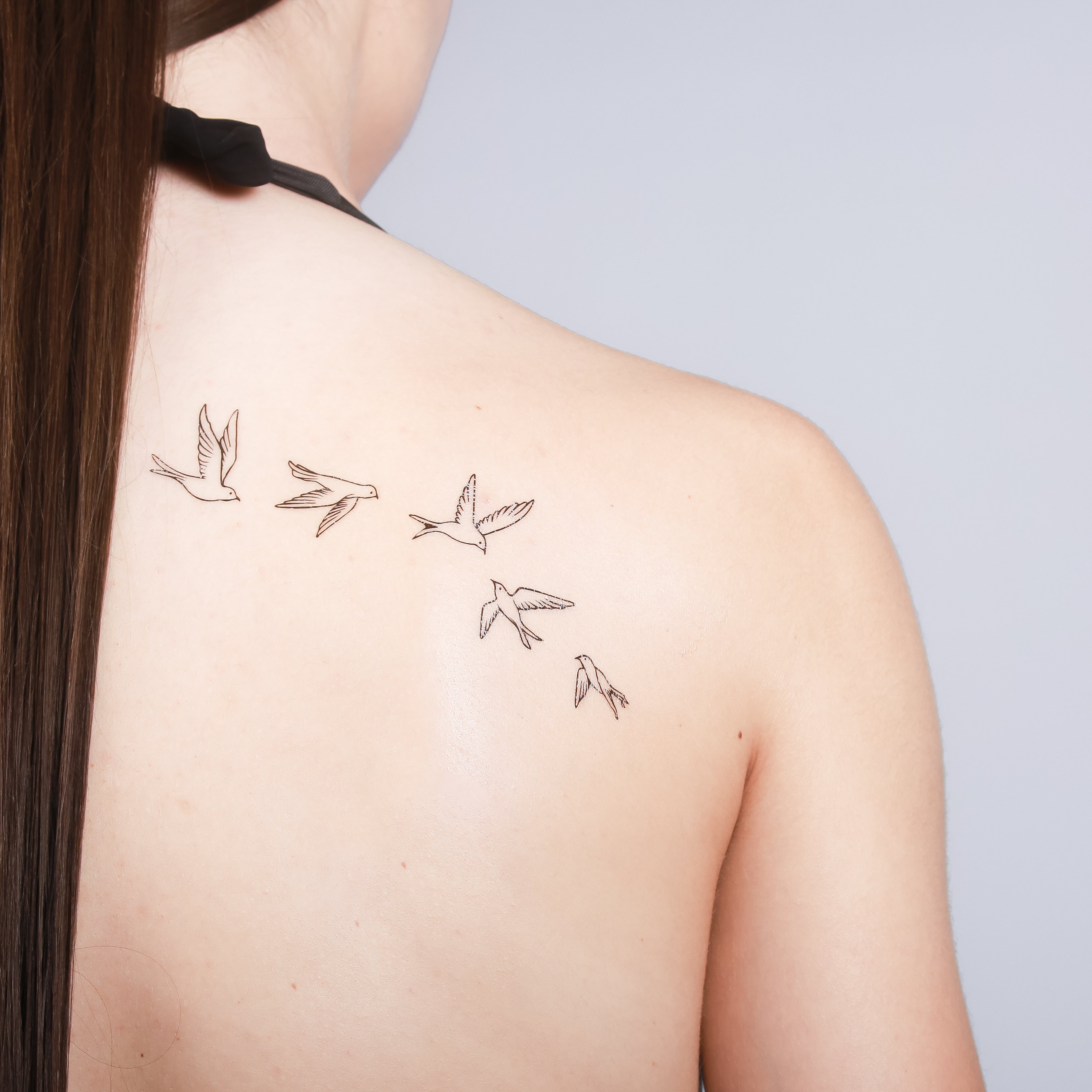 Tatouage hirondelles migratrices The Flash Tattoo