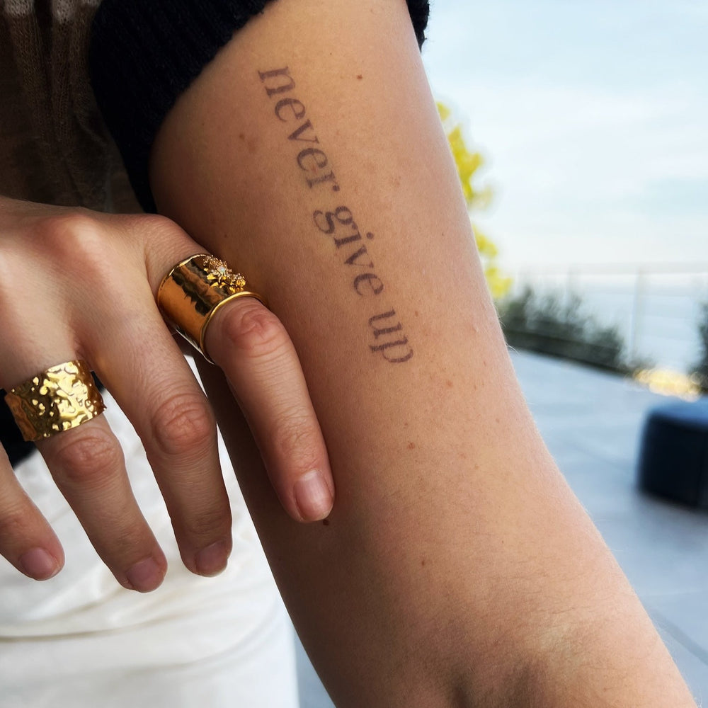Tattoos That Say Never Give Up