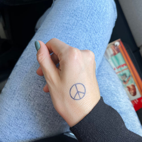 Peace and love tattoo