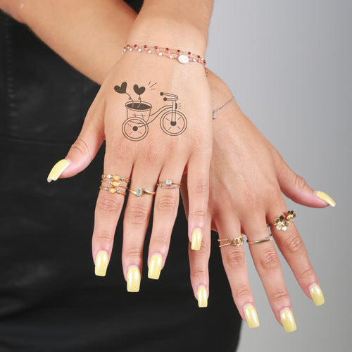 Tatouage vélo avec coeur